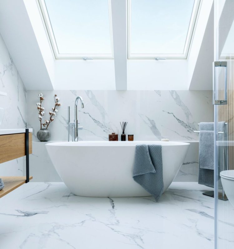 Stylish,Bathroom,Interior,Design,With,Marble,Panels.,Bathtub,,Towels,And